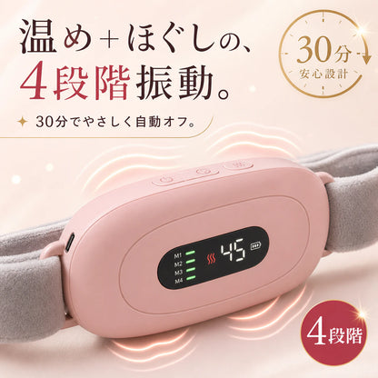 オフィスや在宅で服の下にコードレス温熱ベルトをつけて温活する女性